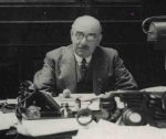 Samuel Stephany at his desk at New Court c.1933
