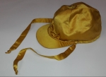 Jockey's cap in the distinctive Rothschild gold colour