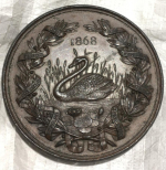 Medal awarded at the Halton and Aston Clinton Industrial Exhibition 1868