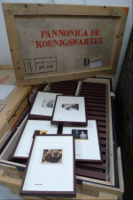 Unpacking the framed images from their crates upon arrival at The Rothschild Archive